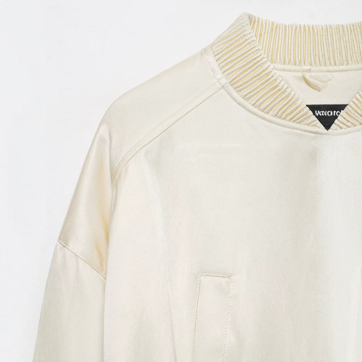 Chaqueta bomber holgada beige con cremallera