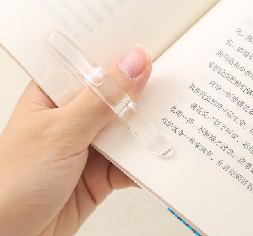 Sujetapáginas de pulgar para lectura