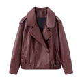 Chaqueta de cuero sintético texturizado con doble botonadura