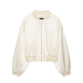 Chaqueta bomber holgada beige con cremallera