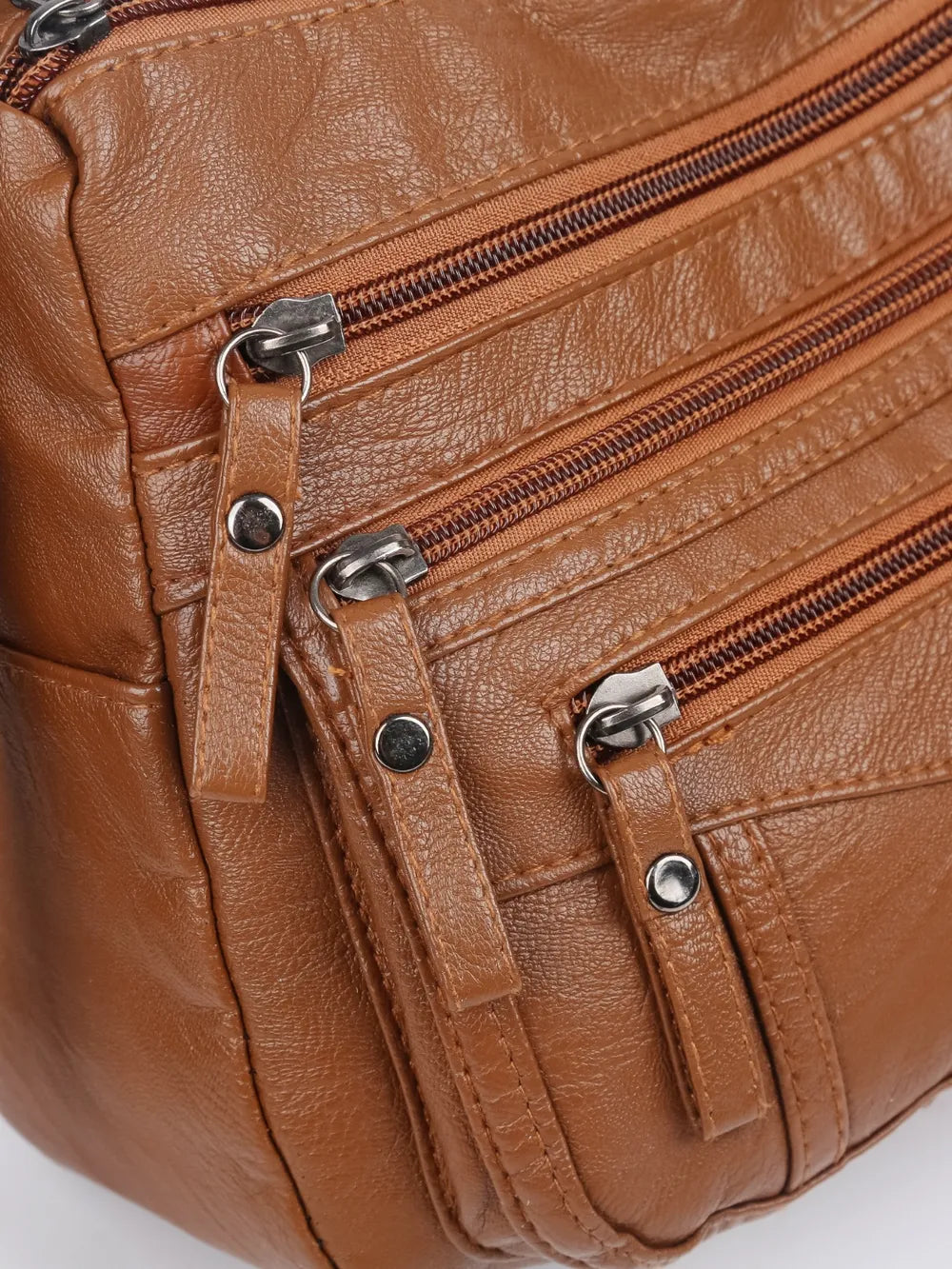 Bolso bandolera con varios compartimentos de 26 × 18 × 9 cm