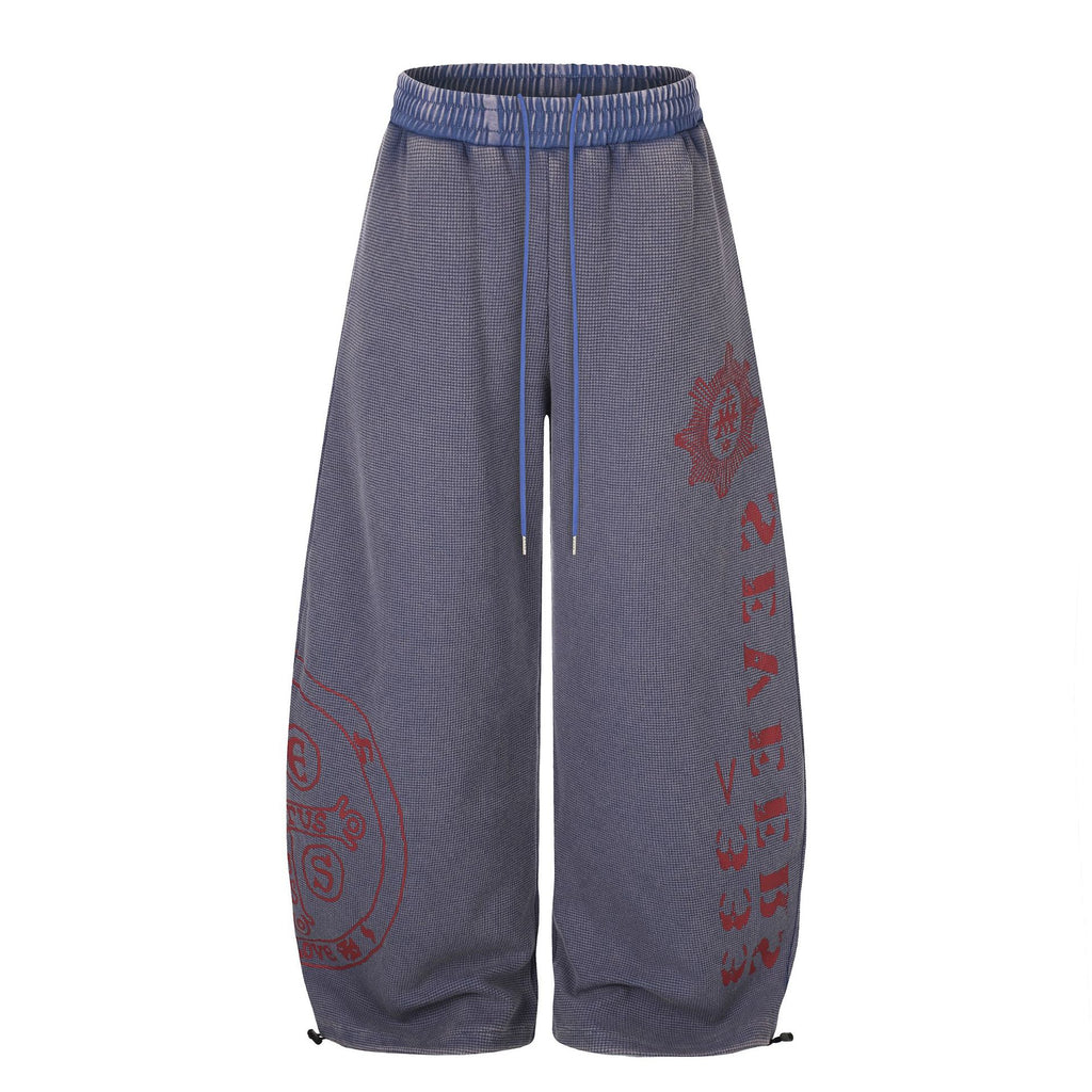 Pantalón ancho tipo waffle con cintura elástica y cordón